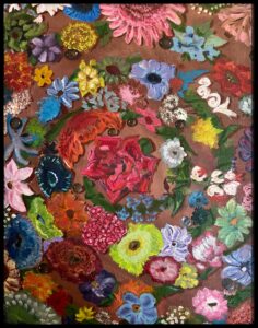 Colorful floral arrangement filled with vibrant blossoms.